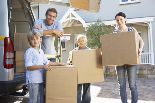 Professional movers organising boxes and fragile items in Bermondsey