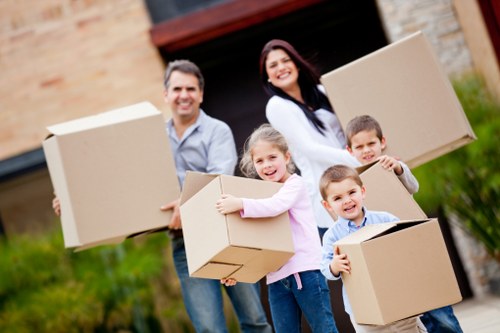 Professional movers loading items into a van in Bermondsey