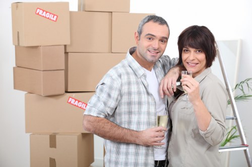 Professional movers packing furniture for a Bermondsey relocation